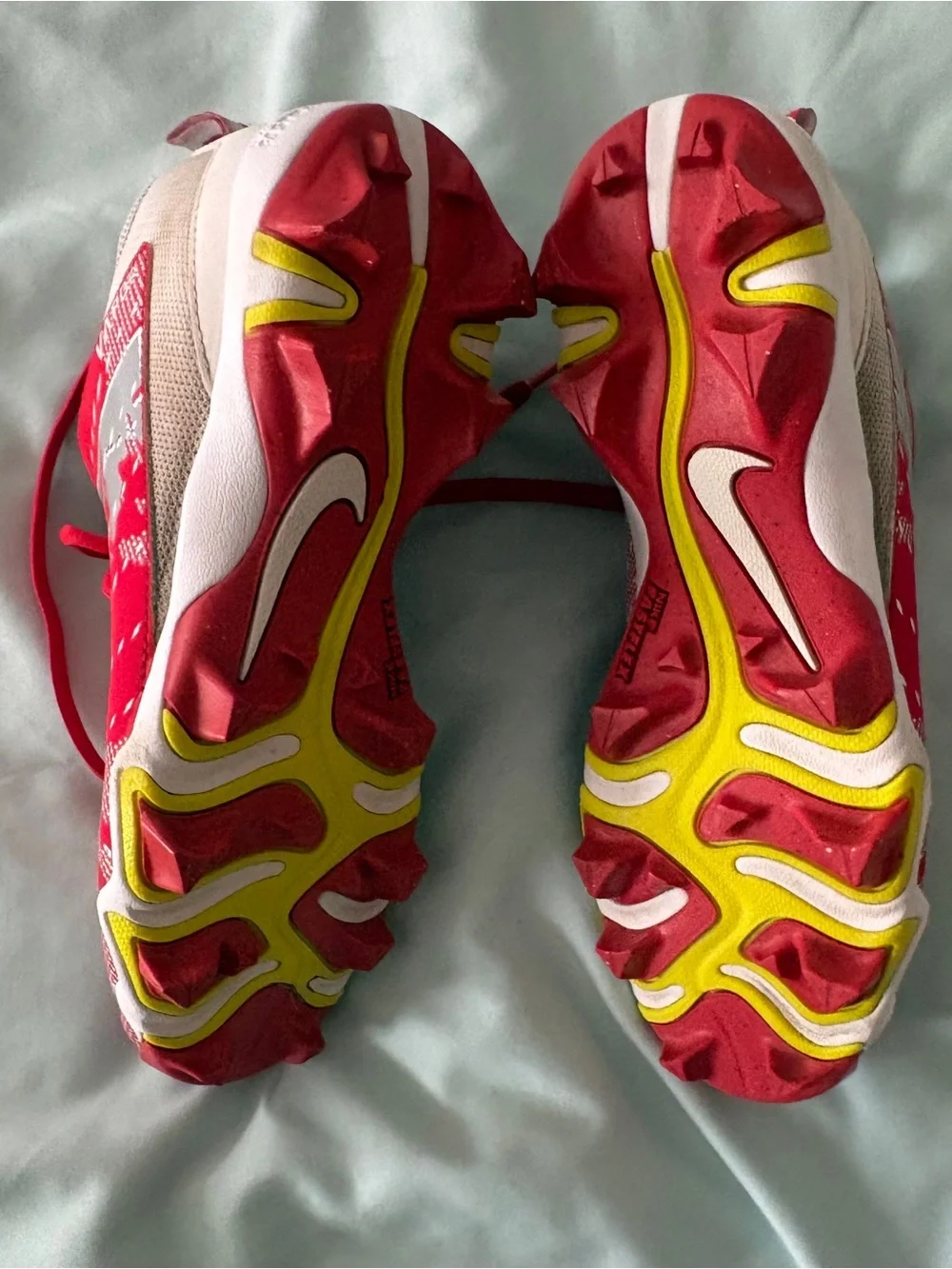 Nike Red and White Youth 4.5 Cleats with Yellow Sole Accents